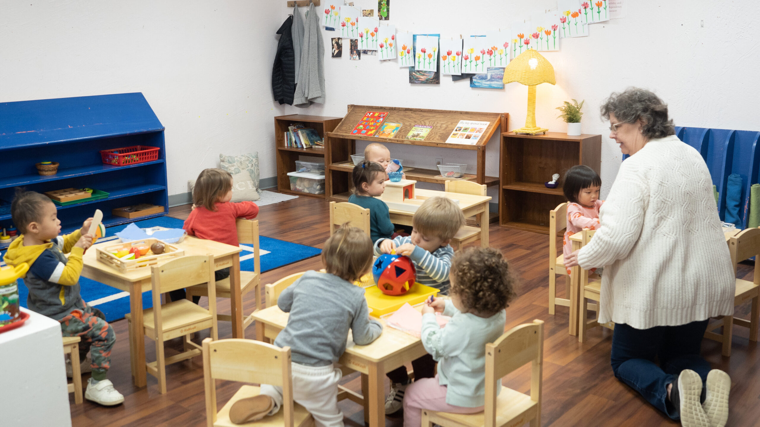 Montessori students learning practical activities in the classroom