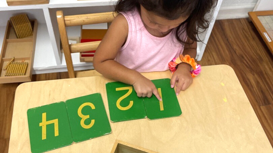 montessori student practicing math skills 