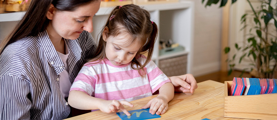 A Montessori student and teacher learn together