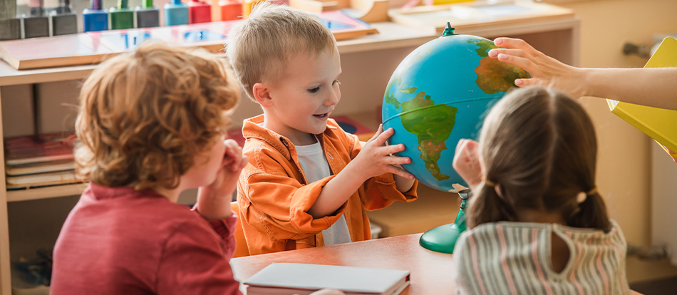 Montessori preschool students learn about the world